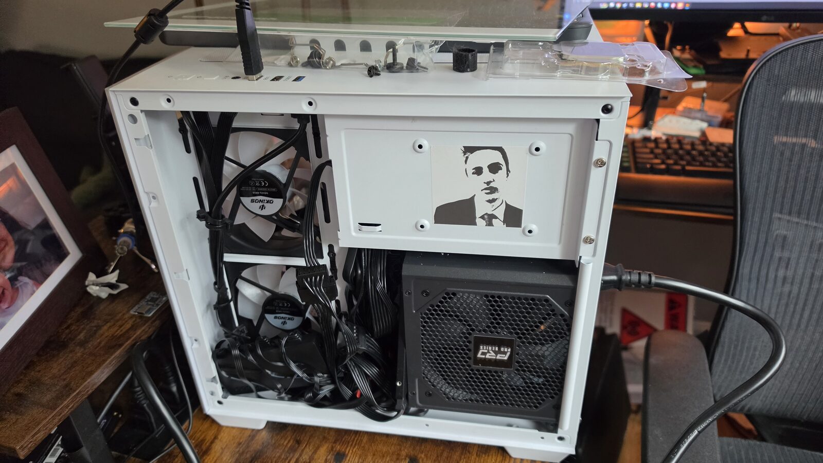 Jake's PC build in progress, case open, fans and PSU installed